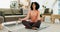 Woman, meditation and zen in home for breath work, spirituality and calm in living room. Floor, mat and yoga or pilates
