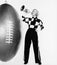 Woman with megaphone and huge football