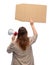 woman with megaphone protesting on demonstration