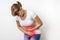 Woman with menstrual pain is holding her aching belly