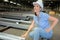 Woman in metalworking factory