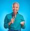 Woman, microphone and studio portrait for interview, news program or questions for talk show by blue background. Young