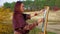 Woman Of Middle Age Drawing A Picture At Plein Air