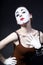 Woman mime with theatrical makeup