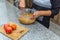 Woman mixing dough for a cake in her kitchen