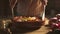 Woman mixing sliced vegetables in a bowl