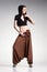 woman model posing in large (salwar) pants - studio fashion shot