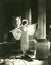 Woman modeling a dress made of pearls