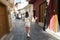 Woman a modern female traveler walks through the streets of old Antalya in the Kaleichi district in Turkey. cozy old town, a good