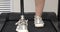 A woman with a modern robotic prosthetic leg is working out in the gym. Physiotherapy rehabilitation that allows a