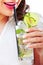 Woman with mojito glass isolated