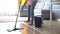 Woman mopping floor, tips for correct cleaning wooden surface, linoleum or tile