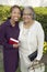 Woman and Mother standing in garden with Bibles portrait