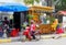 Woman motorbike take away fruit juices, Cambodia