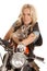 Woman on motorcycle look serious kangaroo