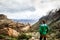 Woman on mountain admiring majestic landscape in Arizona, USA