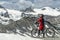 Woman with mountain bike on the Gornergrat in Zermatt, Switzerland