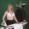 Woman naval officer ironing uniform