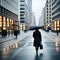 Woman in a navy trench coat walking in a rainy city with a blue umbrella