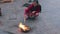 Woman near the holy fire on streets of Kathmandu in Nepal.