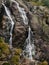 Woman near Siklawa waterfall in Tatra mountains