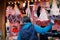 Woman near stall with Heart shape Gingerbread cookies Memorial Church