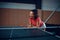 Woman at the net, table tennis, ping pong player