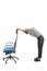 Woman next to her office chair doing exercises, isolated