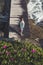 Woman next to the sea, with flowers