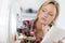 Woman next to water in electric boiler