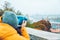 Woman at observation deck enjoy view of the city