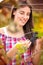 Woman observing grapes