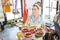 Woman offering tray with delicious tarts