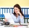 Woman at office reading a letter