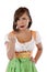 Woman with oktoberfest dirndl clenches fist