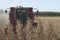 Woman operating Combine Harvestor