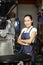 Woman operating professional roaster