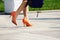 Woman in orange shoes