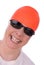 Woman with an orange swim cap