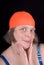 Woman with an orange swim cap