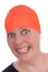 Woman with an orange swim caps