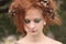 Woman with Orange Teased Hair with Dead Flowers