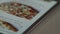 Woman Orders Pizza Using Online Delivery Service With Smartphone. Close Up. 4K UHD.