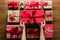 Woman organising beautifully wrapped vintage christmas presents, view from above