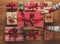 Woman organising beautifully wrapped vintage christmas presents on wooden background, image with haze