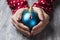 Woman with an ornamented christmas ball