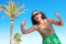 Woman over 50 Thumbs Up Beach Concept