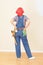 Woman in Overalls and Toolbelt