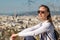 Woman overlooking Barcelona cityscape from Montjuic