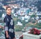 Woman overlooking the city view, Dalat, Vietnam